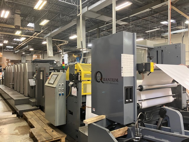 JD Graphic’s RMGT Roll-to-Sheetfed Offset Perfector Piles Up Millions Per Month & Cuts Paper Costs by 35%